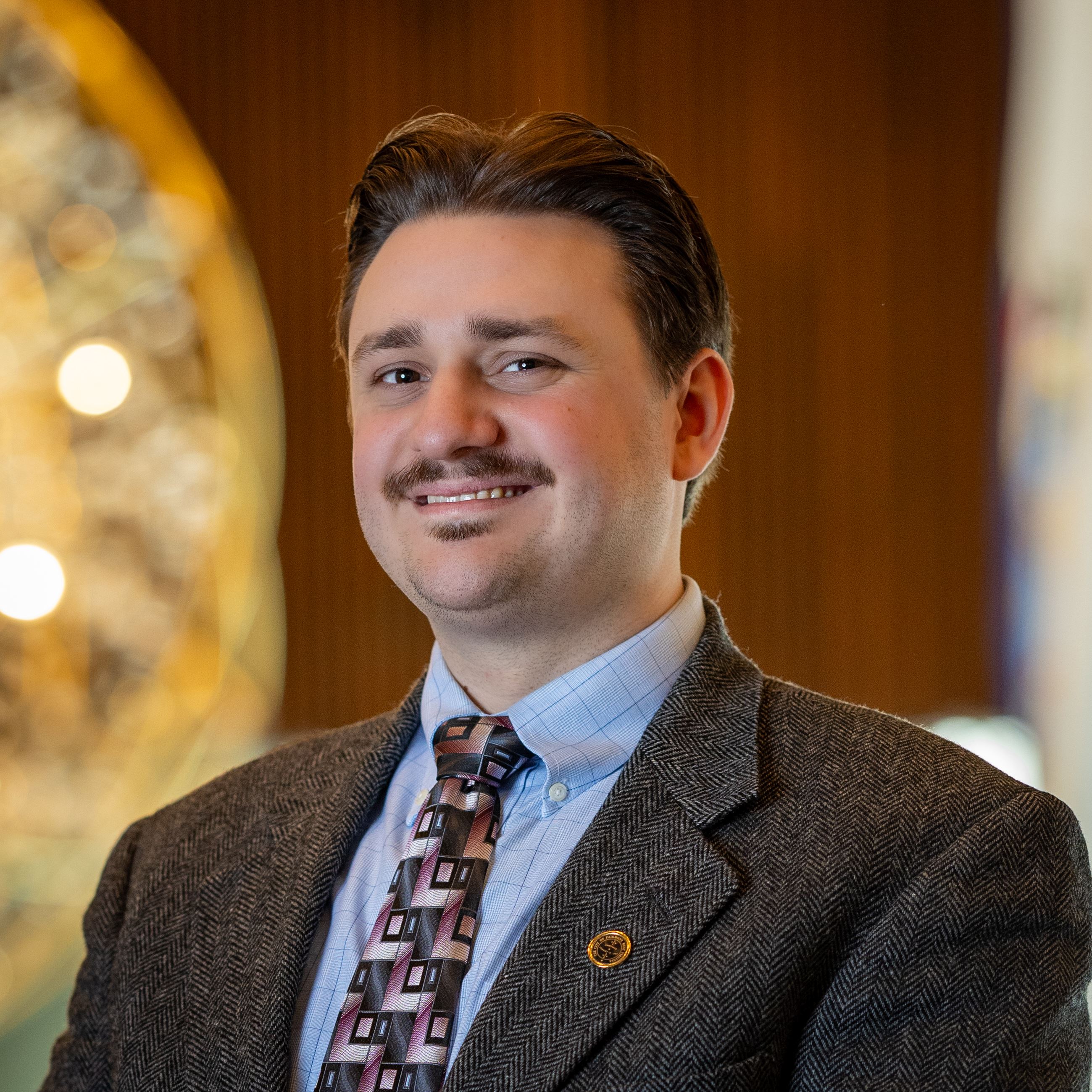 A headshot of the City's Communications Manager.