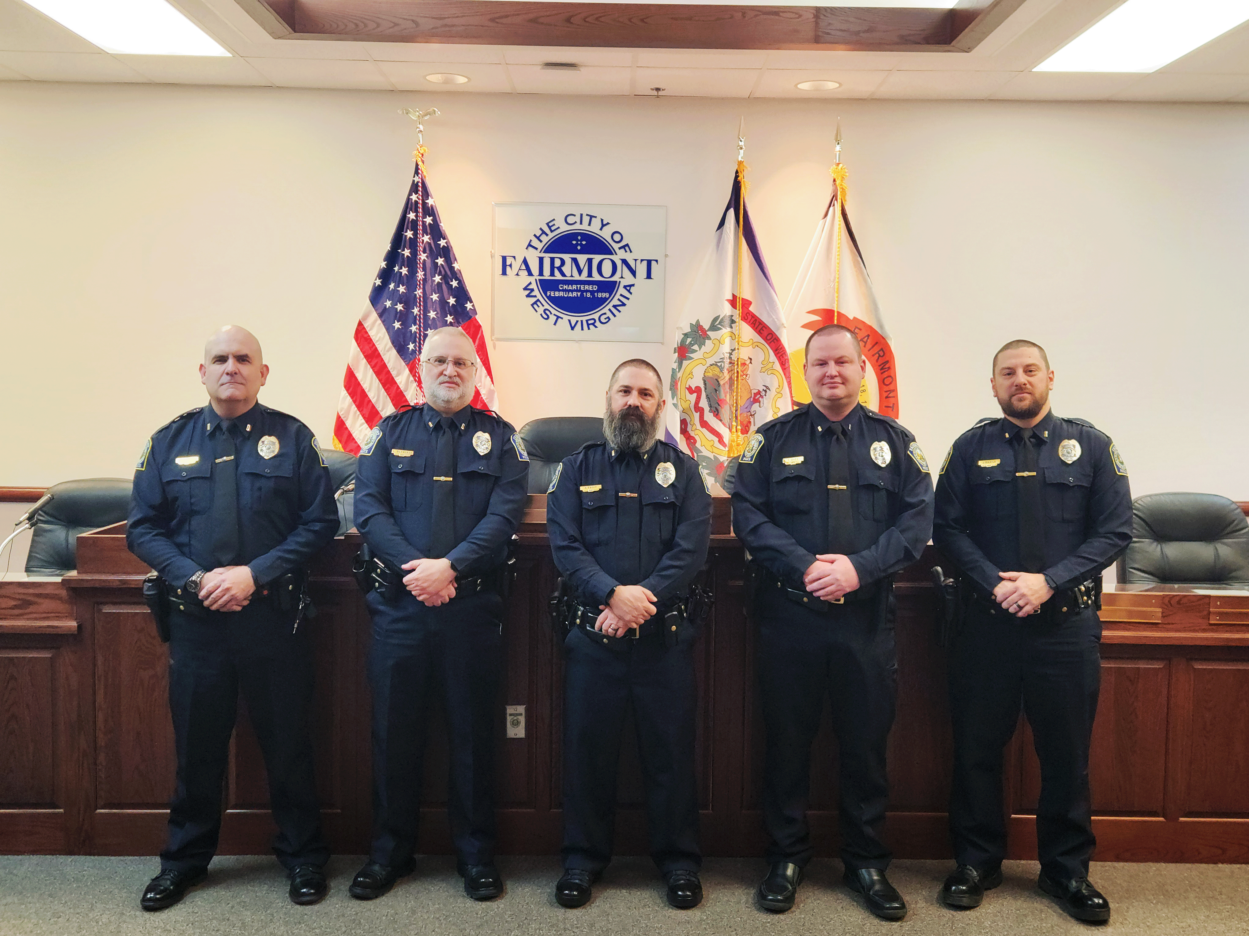 A photo of the five newly appointed police lieutenants in March 2025.